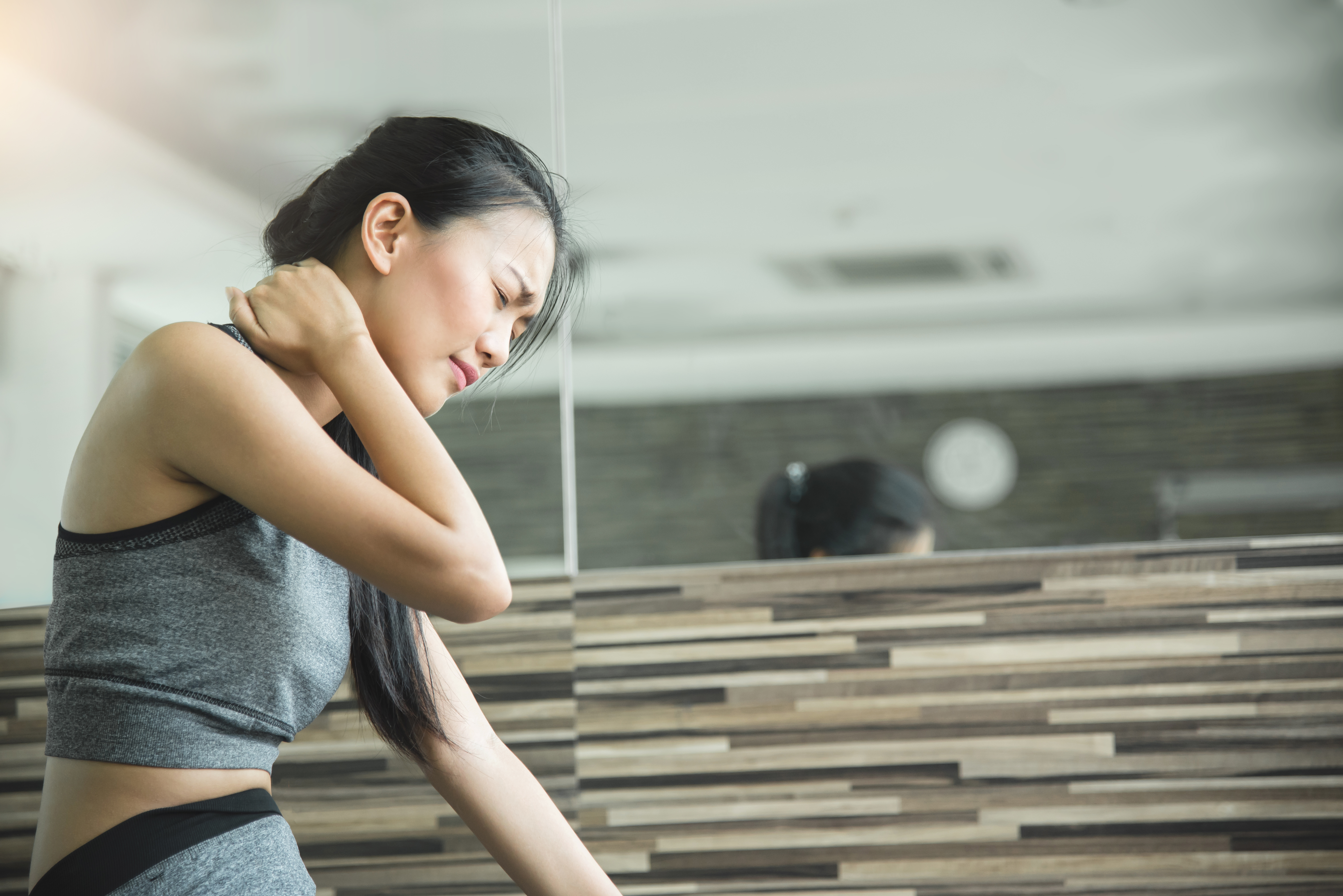 Woman with text neck 